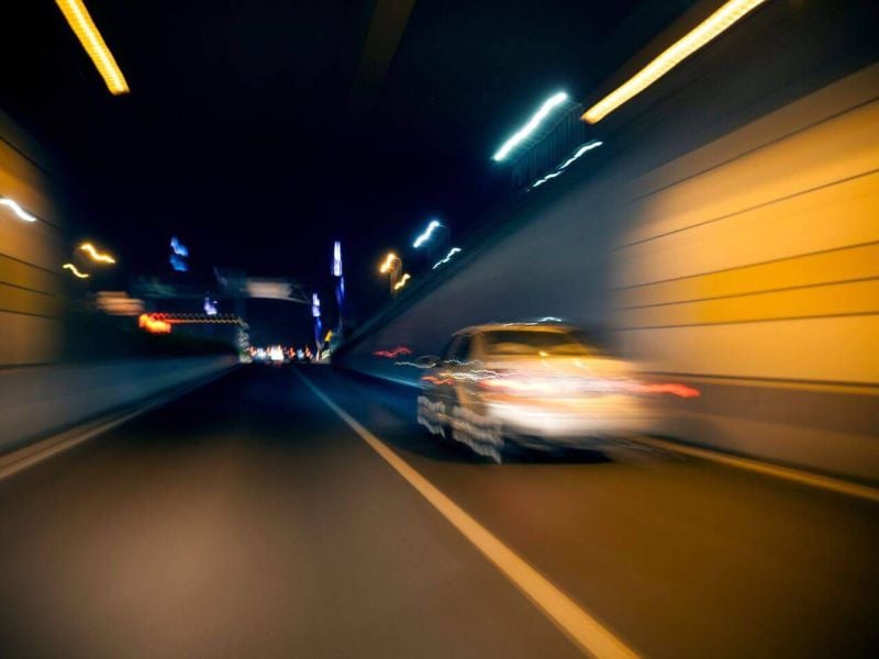 blurry image of a car on the road
